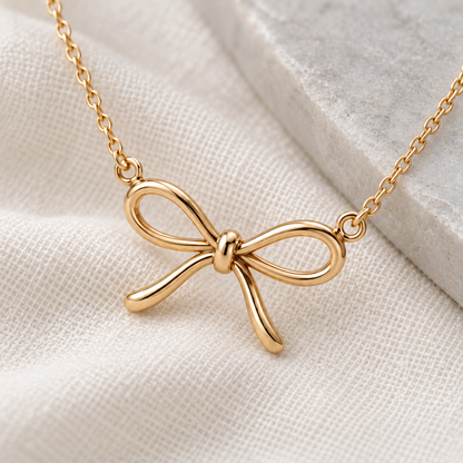 elvarinio Delicate Bow Necklace — close-up design visualization [detail]. AI-generated; product specifications pending verification.