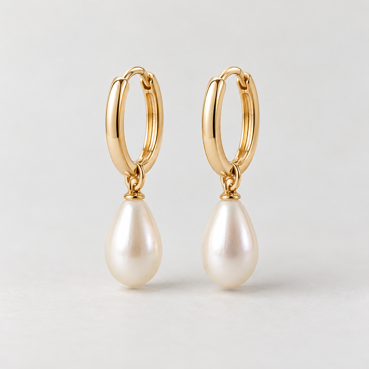 elvarinio Pearl Drop Earrings — studio design visualization [main]. AI-generated; product specifications pending verification.